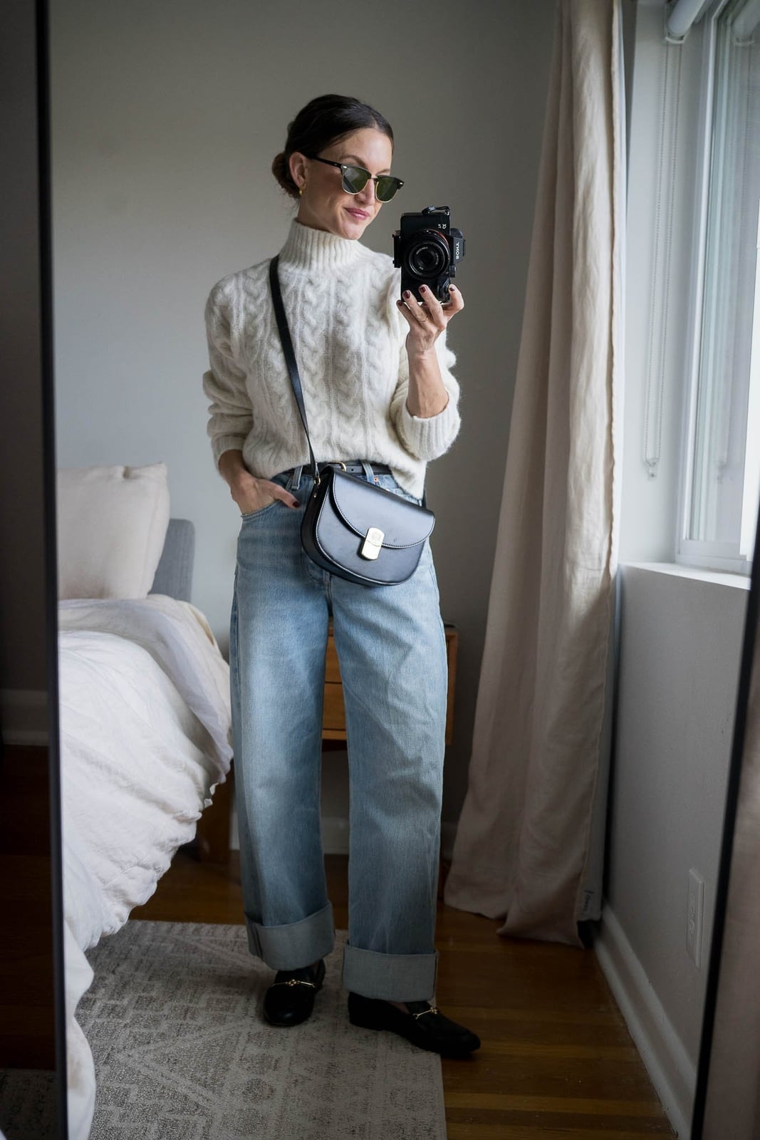 Cream cable knit sweater with light-wash wide-leg jeans — Casual Winter Outfits