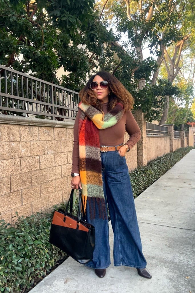 Brown top with wide-leg jeans and oversized plaid scarf — Casual Winter Outfits