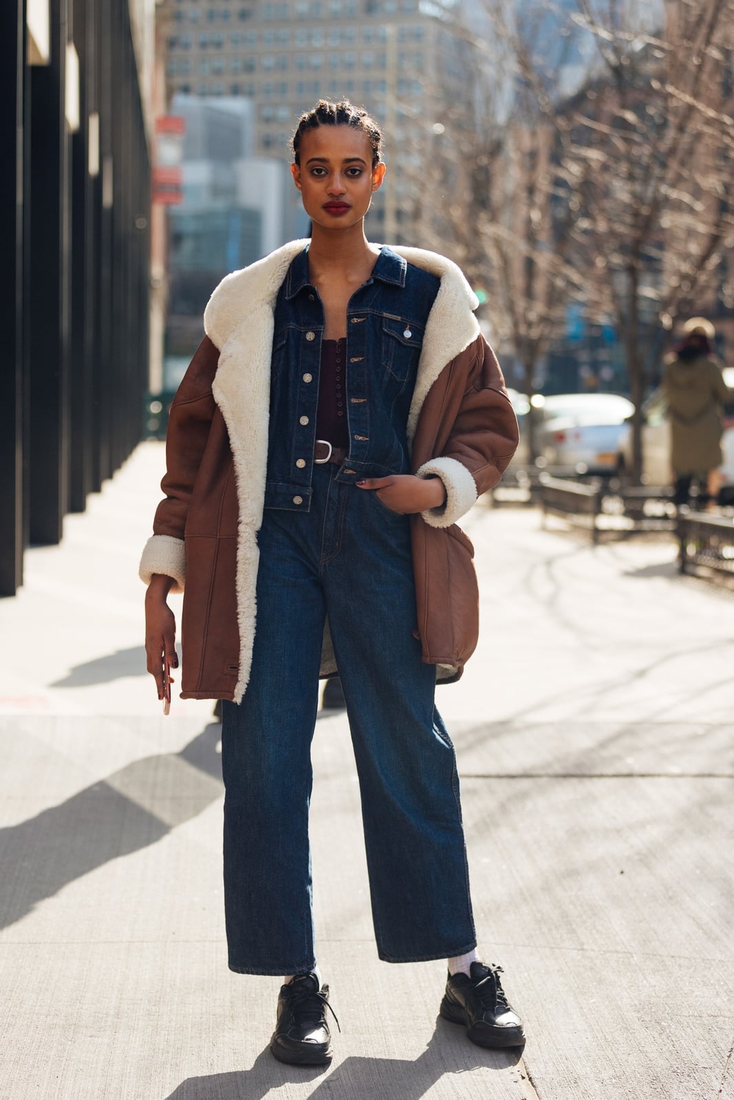Shearling-lined coat over denim jacket and blue jeans — Casual Winter Outfits