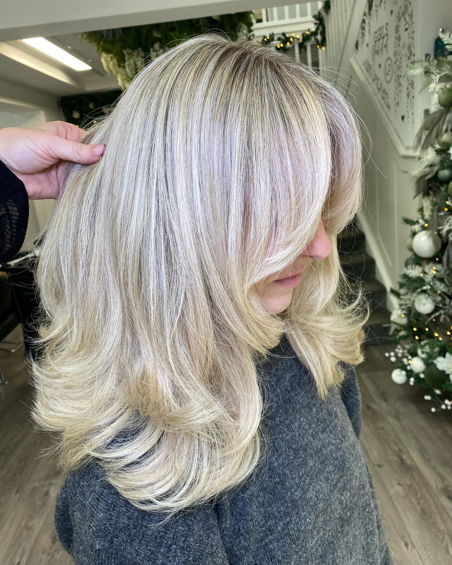 Champagne Blonde Blowout With Face Framing Layers