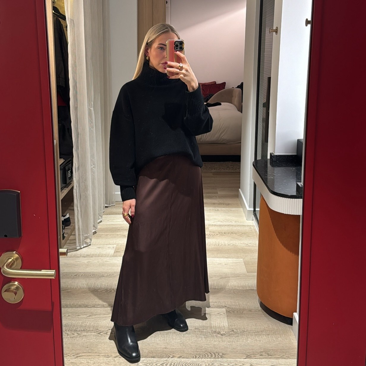 Chic Black Turtleneck and Chocolate Maxi Skirt Combo