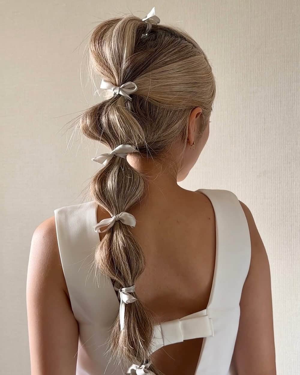Blonde Bubble Ponytail With Satin Bows — Christmas Hair Styles