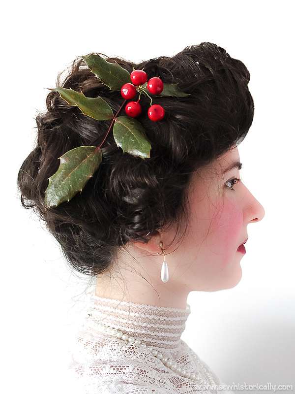 Dark Brown Chignon With Holly Accessory — Christmas Hair Styles