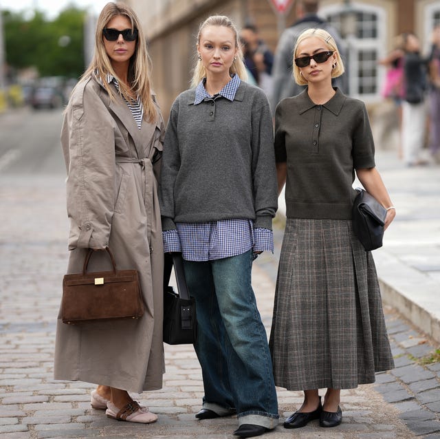 Beige oversized trench coat over striped shirt and wide-leg pants — Cold Weather Outfits