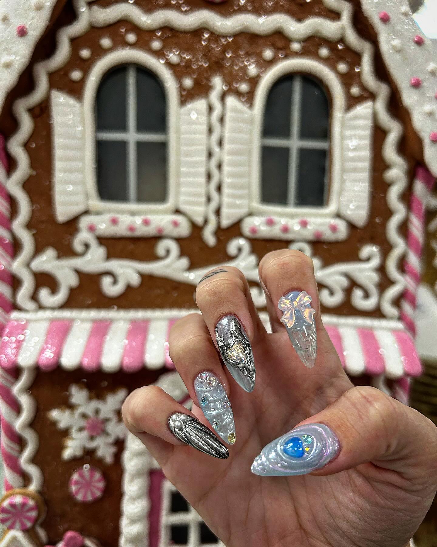 Crystal Bow & Icy Blue Stiletto Nails