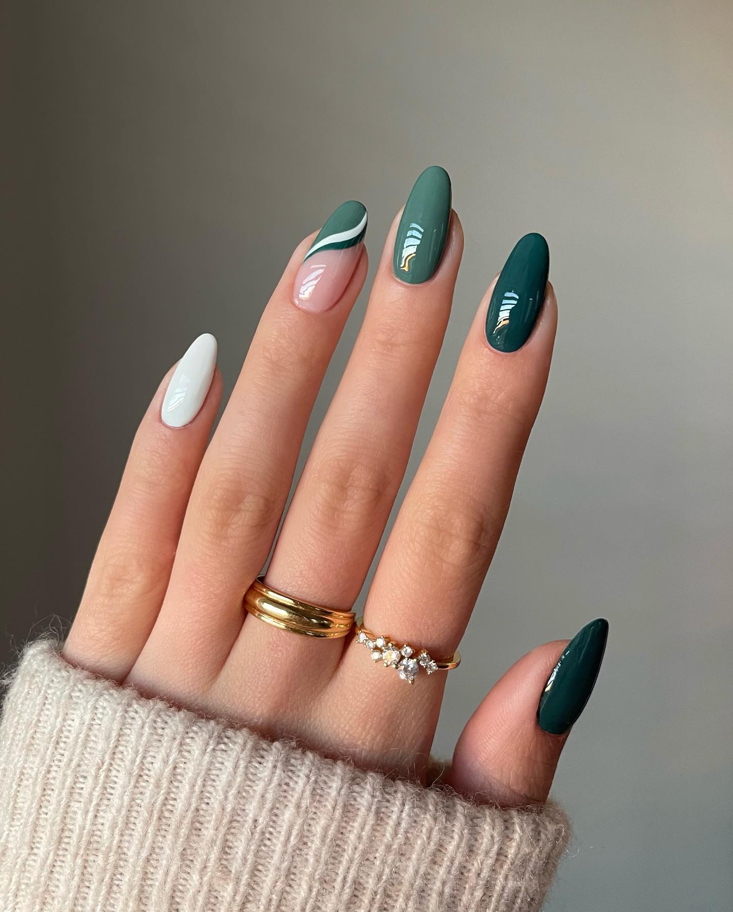 Deep Teal and White Swirl Almond Nails