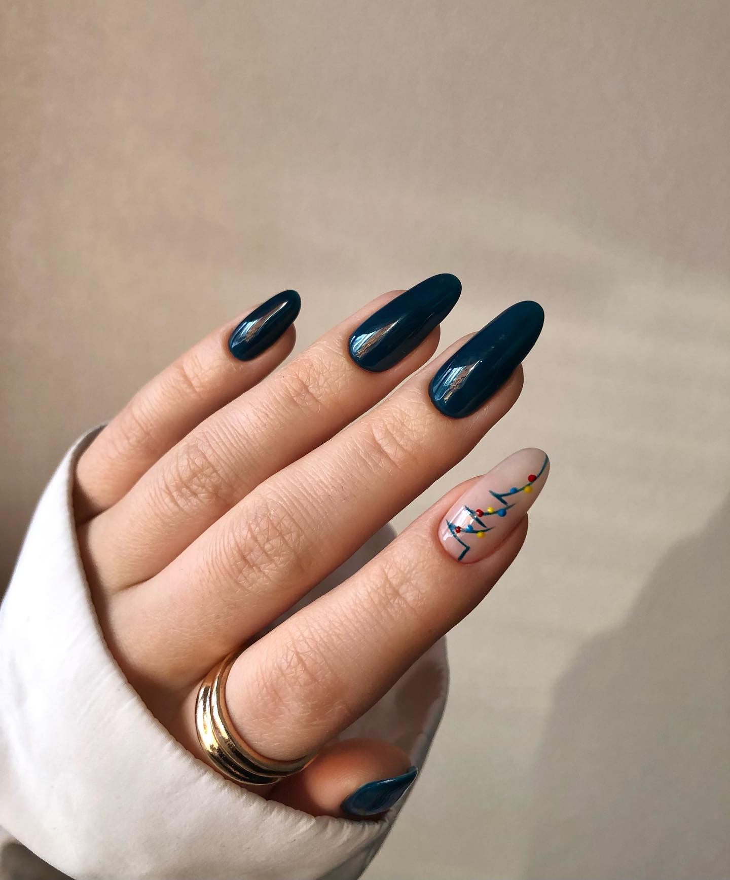 Deep Teal Christmas Lights Almond Nails