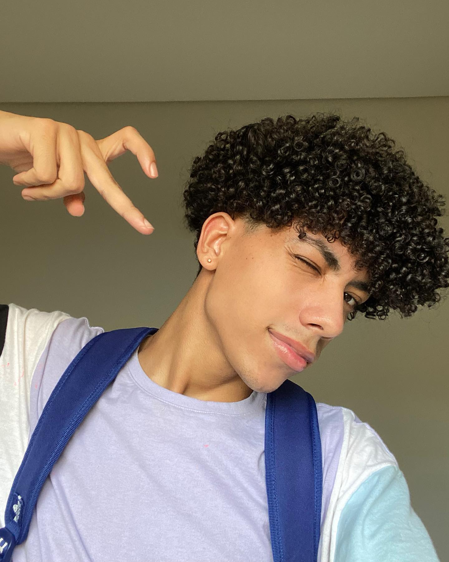 Defined Natural Curls With Tapered Fade