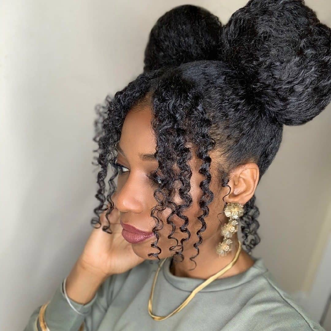 Double Top Knots With Curly Face-Framing Tendrils