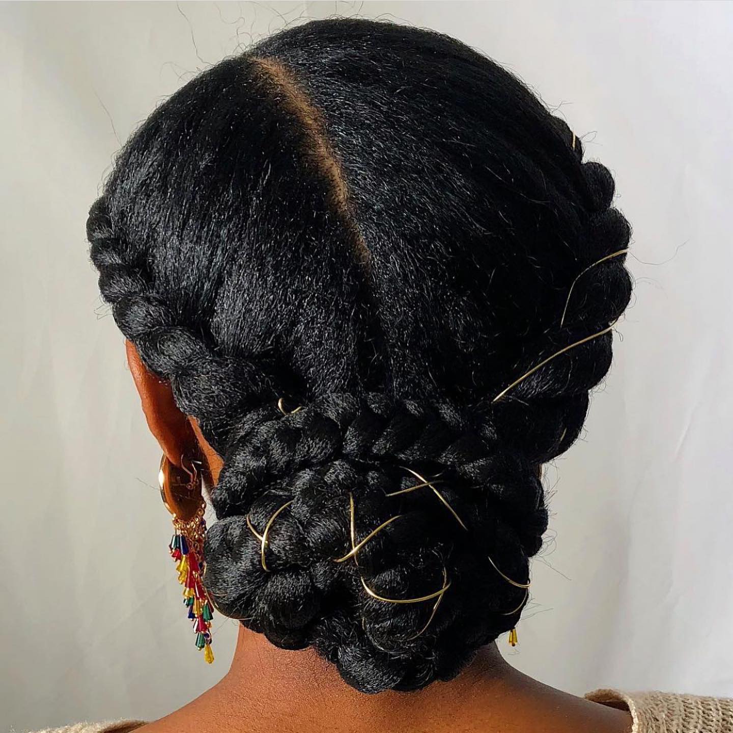 Elegant Braided Updo With Gold Wire Accents