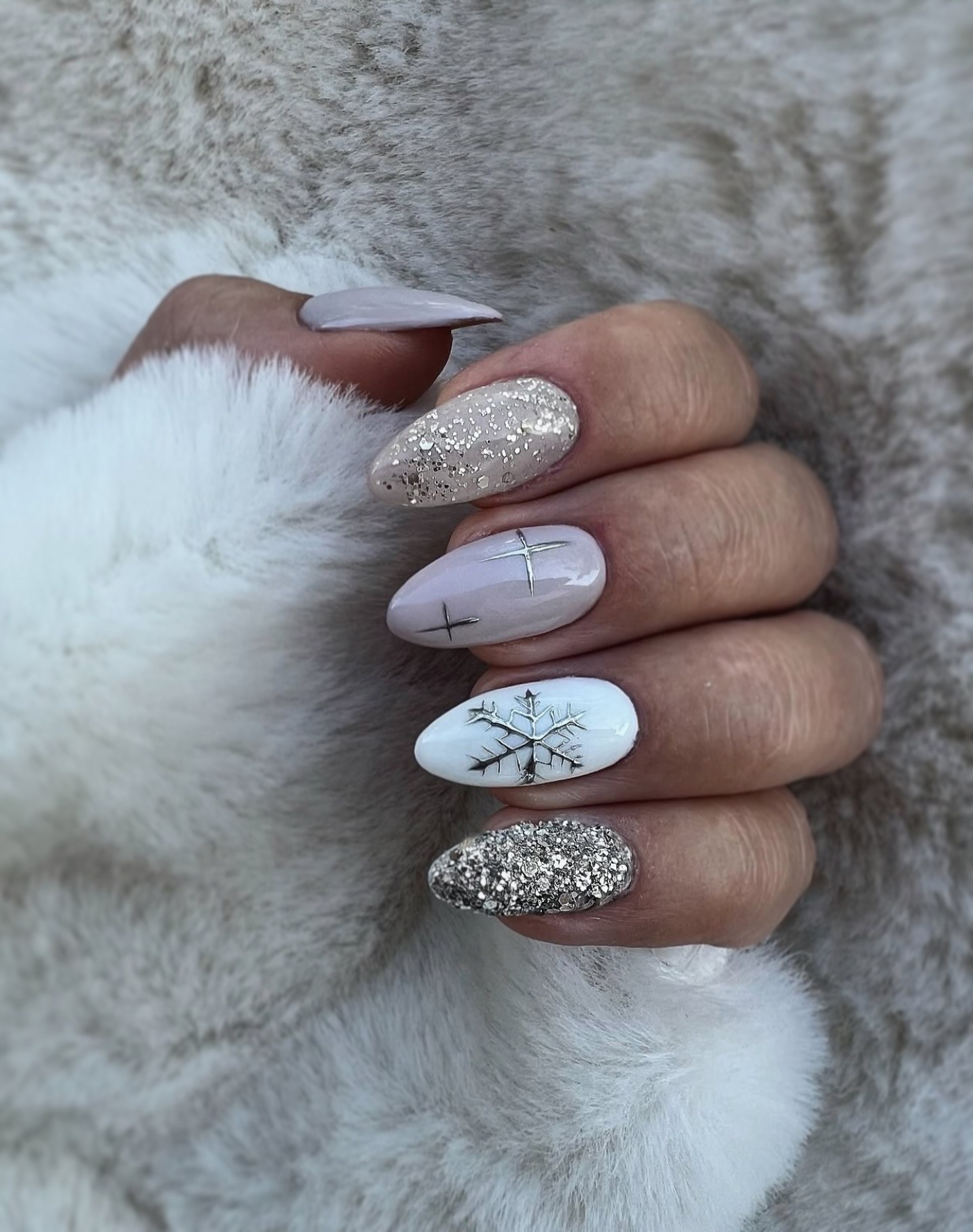 Elegant Snowflake Chrome and Glitter Almond Nails
