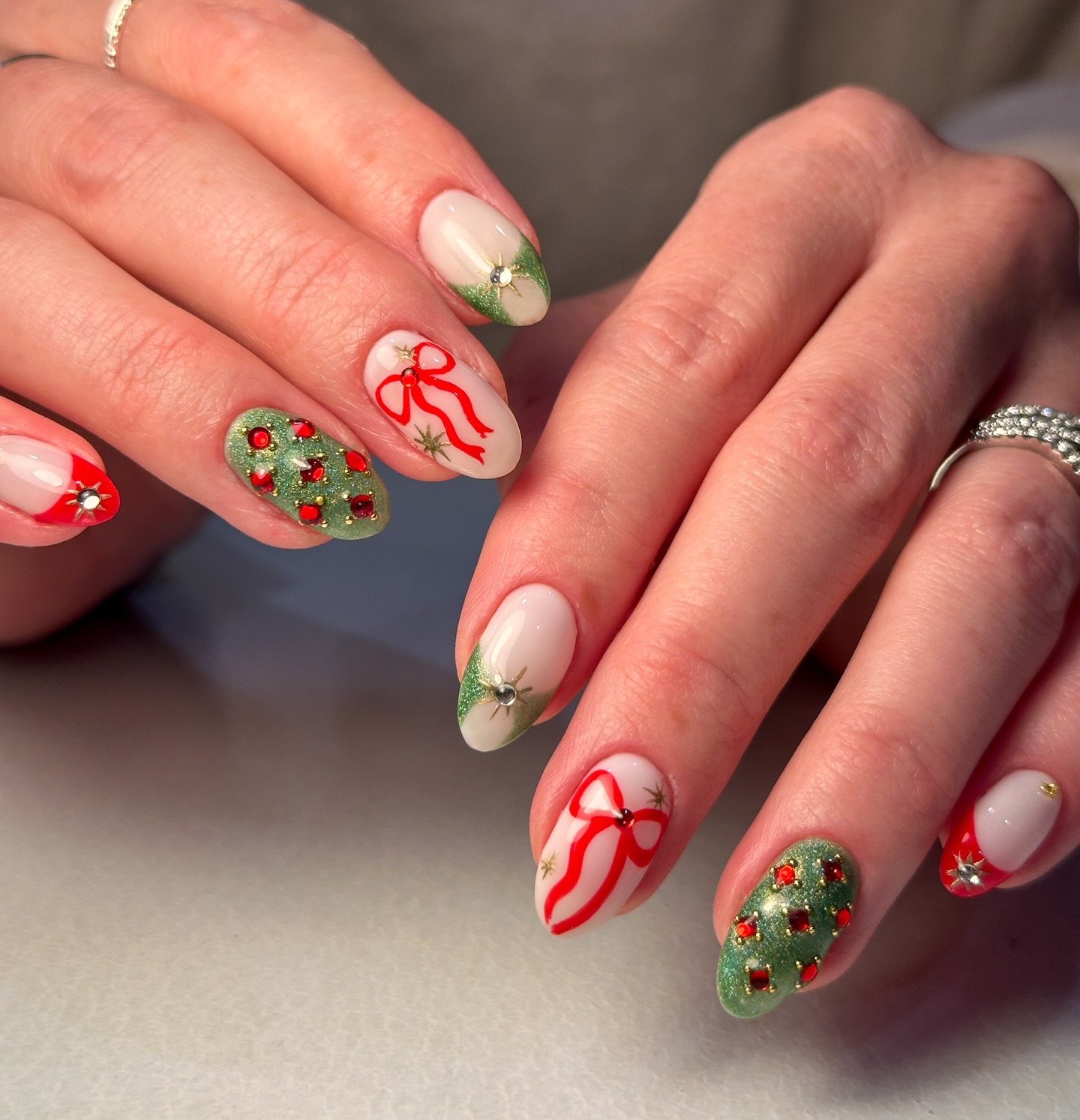 Festive Holiday Bows And Sparkly Lights Nail Art