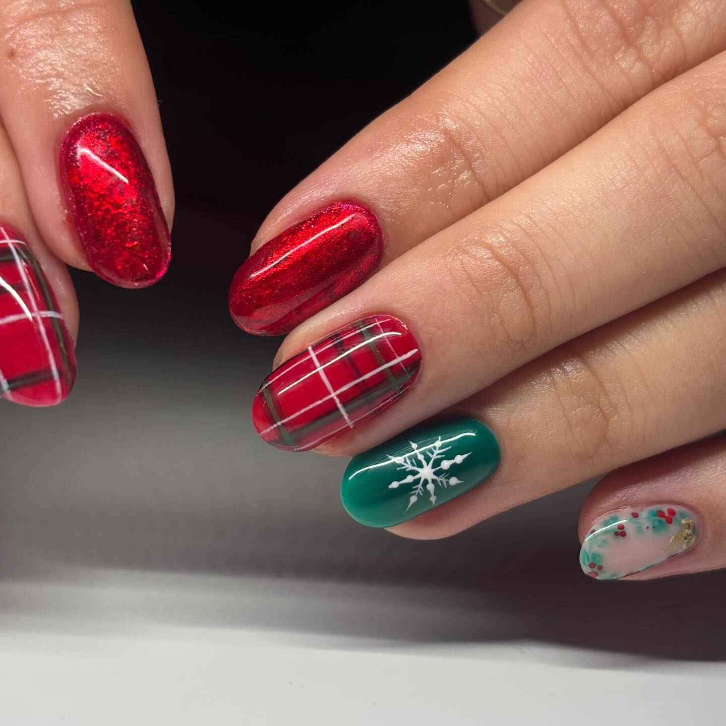 Festive Plaid and Snowflake Christmas Nails