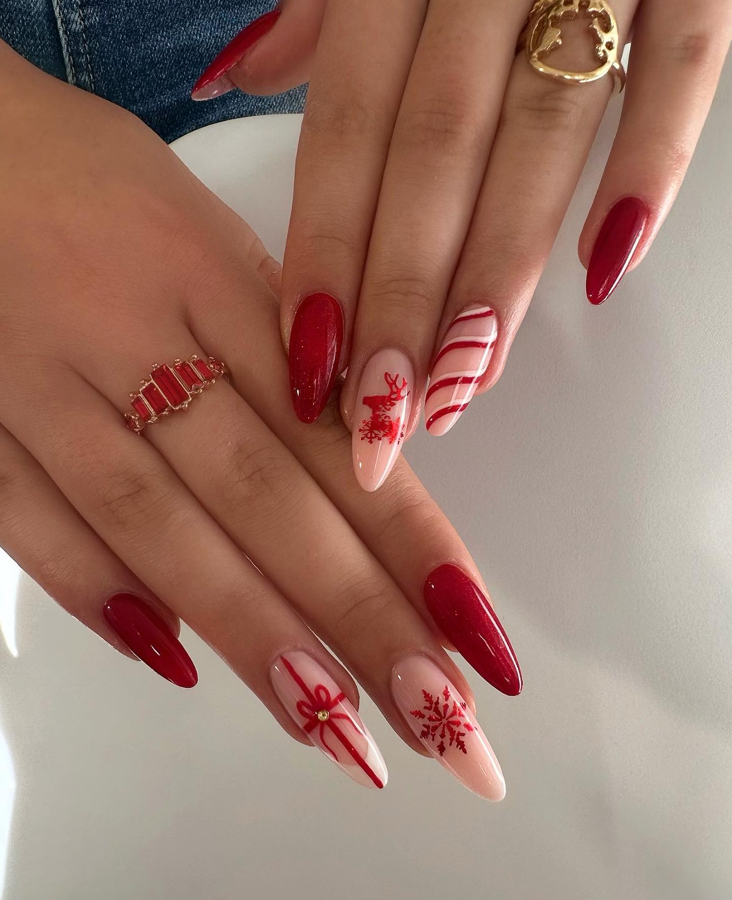 Festive Red and Nude Christmas Almond Nails