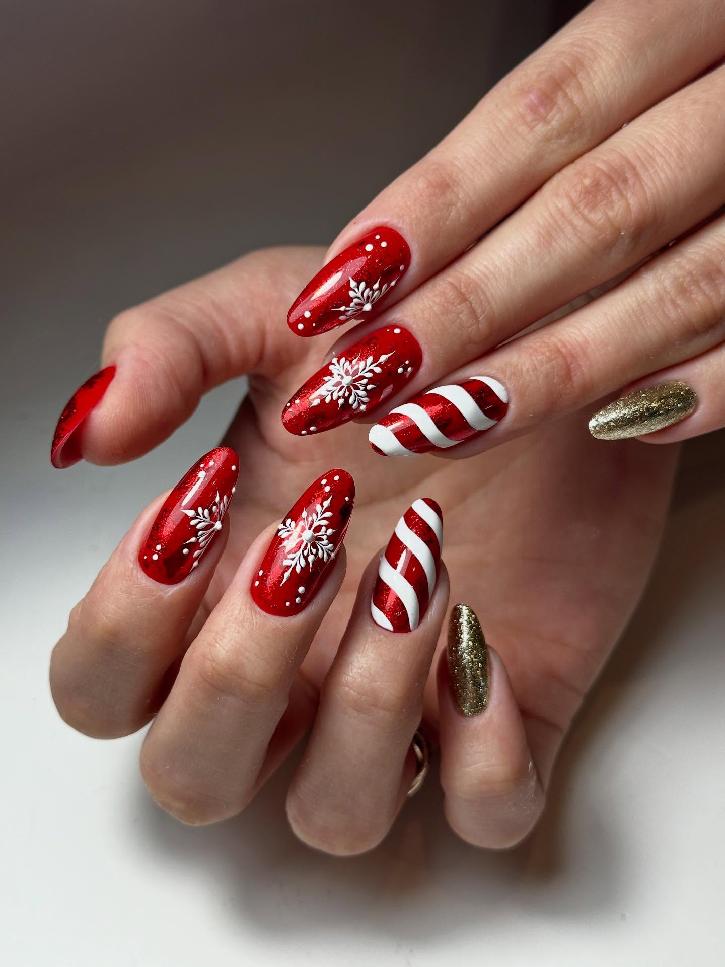 Festive Red Snowflake Candy Cane Almond Nails