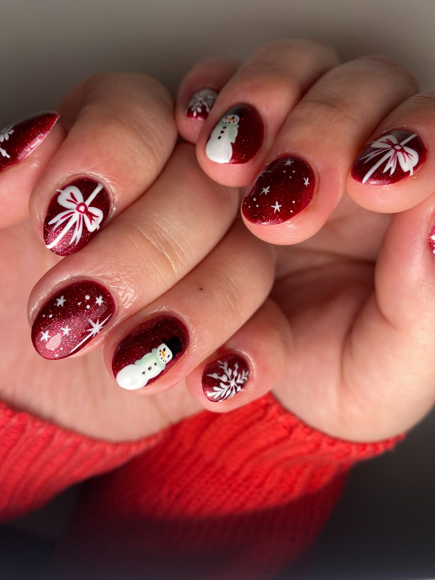 Festive Snowman and Bow Christmas Oval Nails