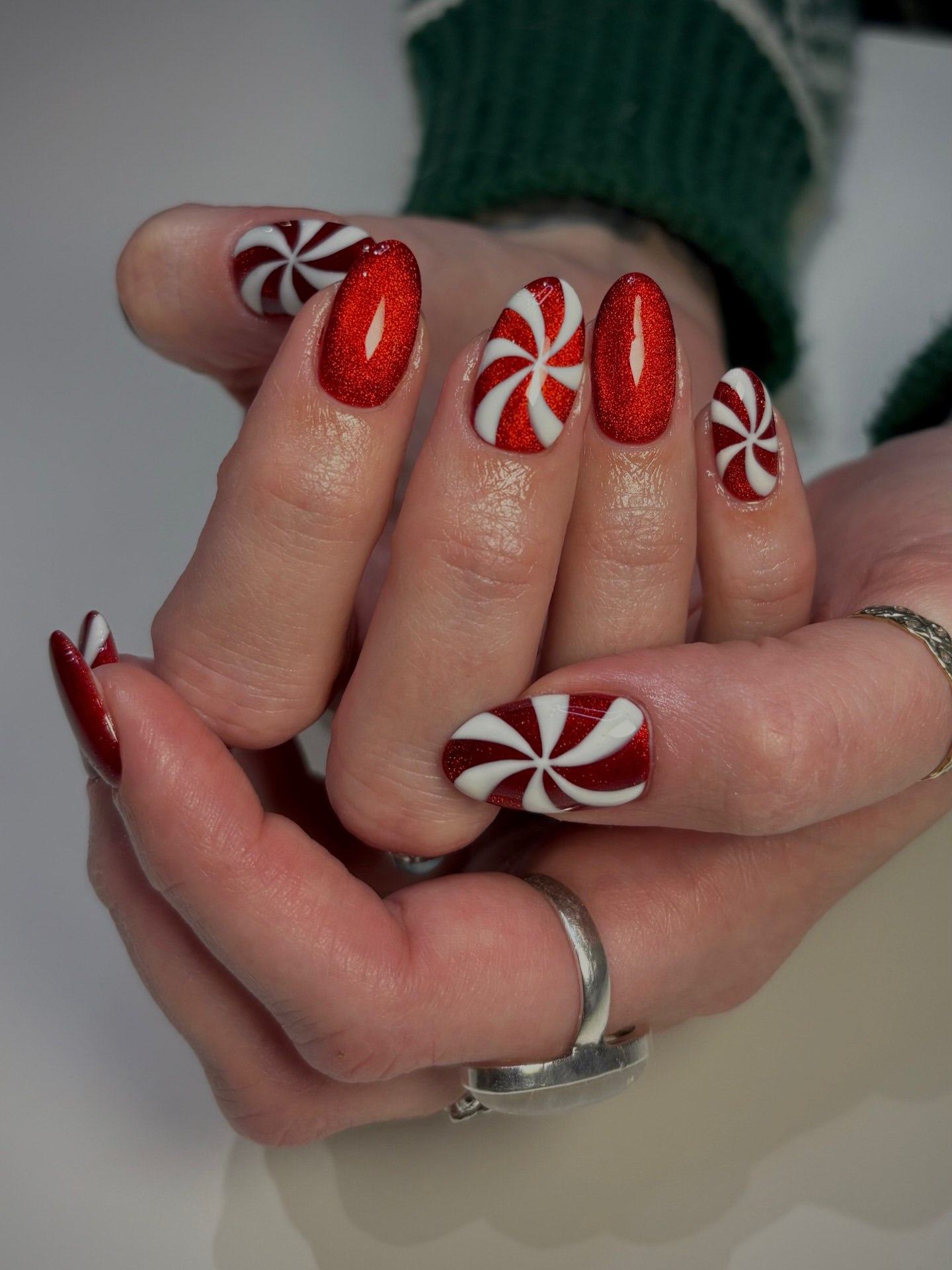 Glittery Candy Cane Swirl Oval Nails