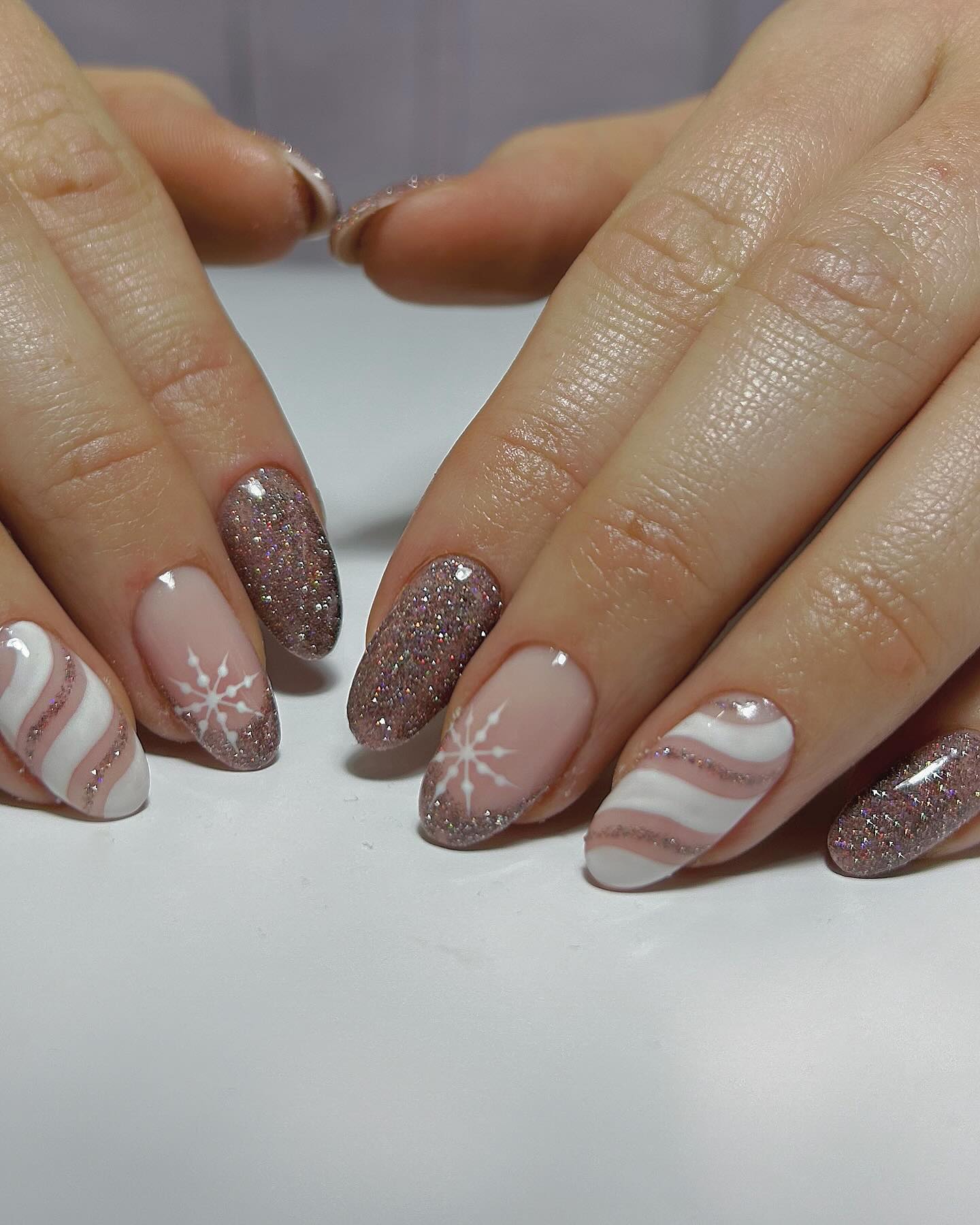 Glittery Snowflake Candy Cane Almond Nails