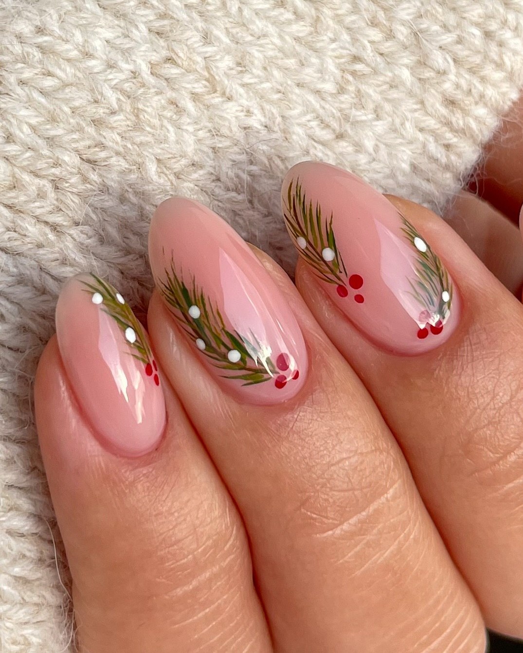 Glossy Nude Almond Nails With Pine Branch Art