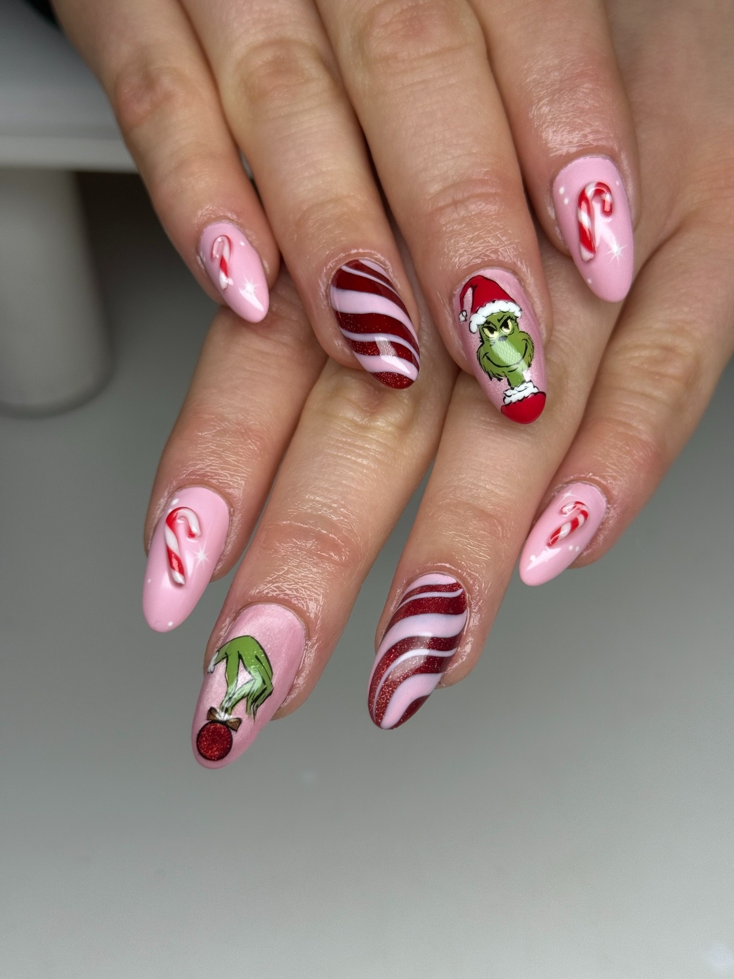 Grinch Candy Cane Striped Almond Nails