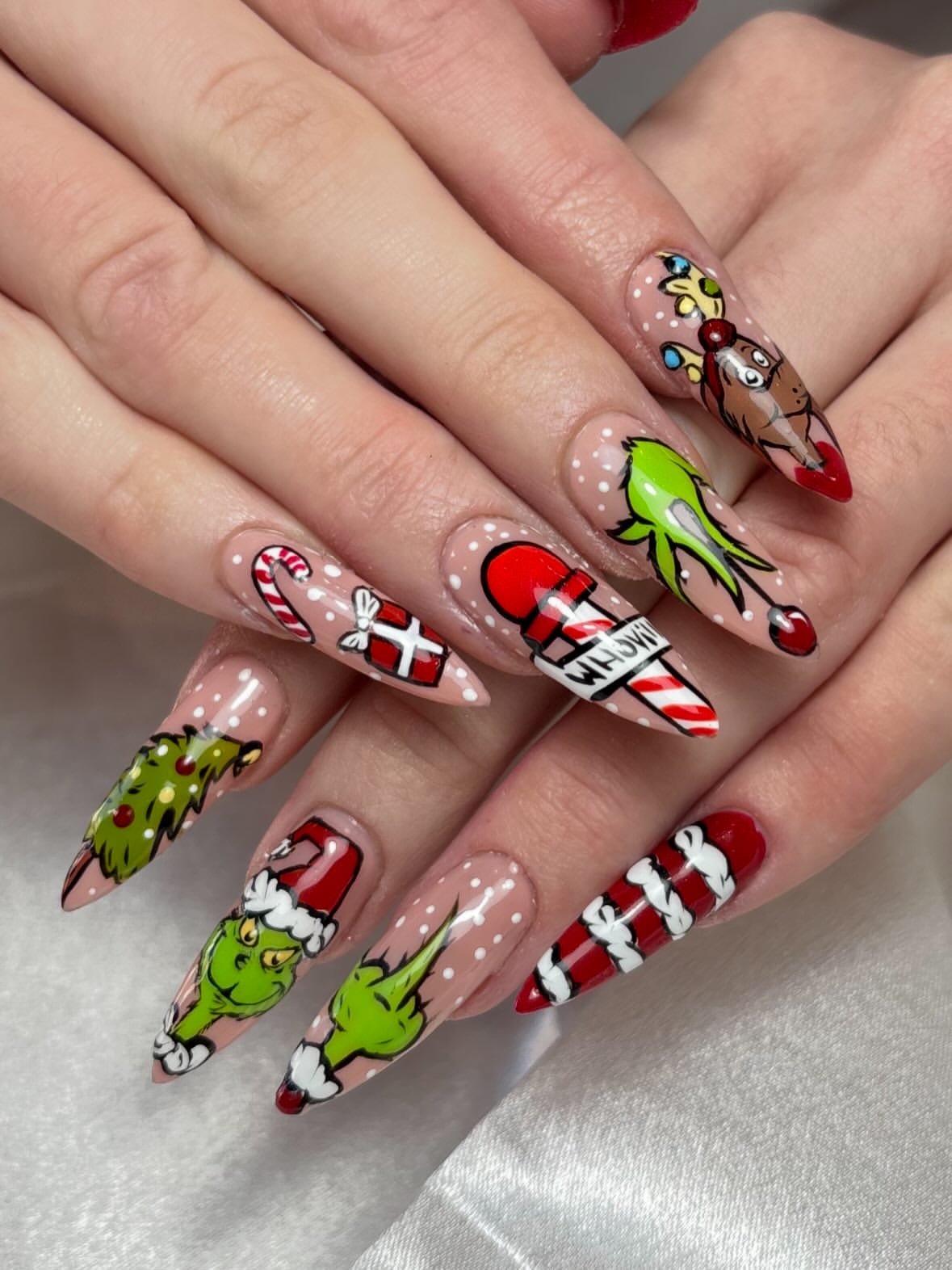 Grinch Christmas Nail Art with Candy Cane Accents