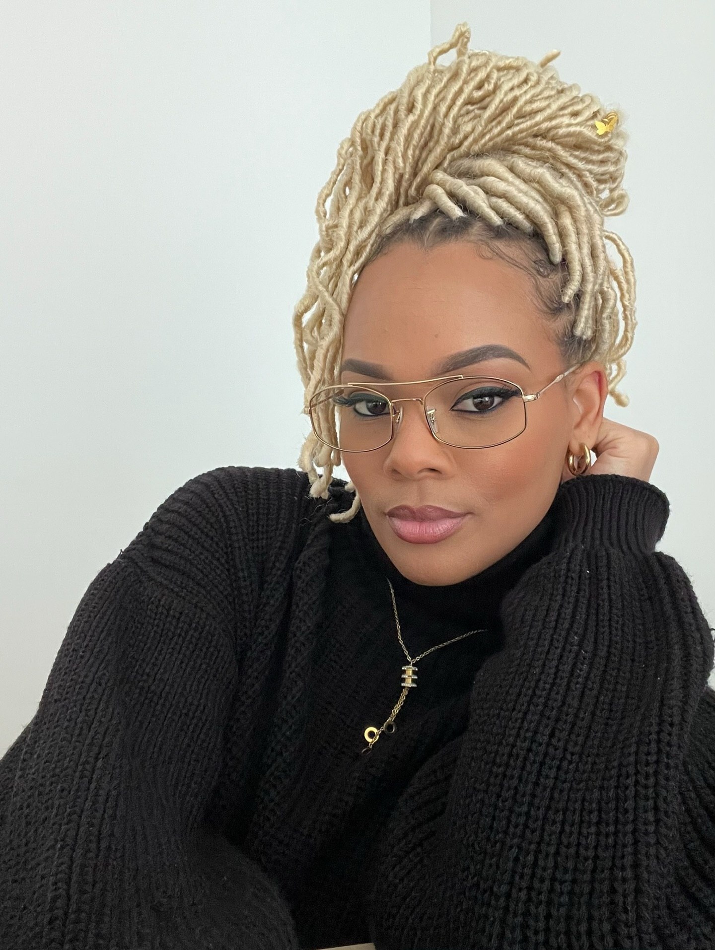 High Top Knot Locs With Golden Butterfly Accent