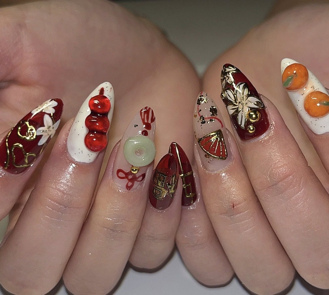 Deep Red Almond Nails With Gold Charms — Lunar New Year Nails