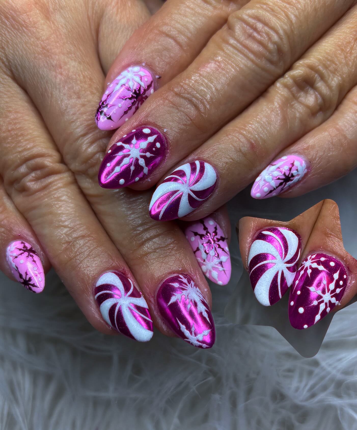 Metallic Pink Candy Cane Snowflake Almond Nails