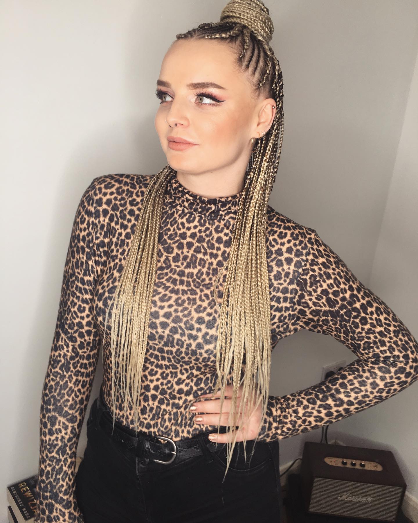 Micro Braids With Platinum Blonde High Bun