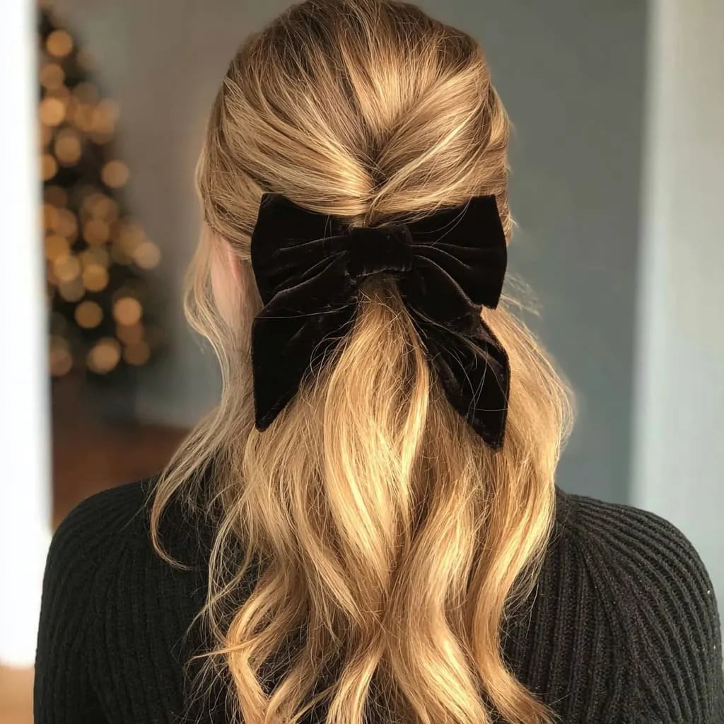 Honey Blonde Half-Up Twisted Style With Bow — New Years Eve Hairstyles