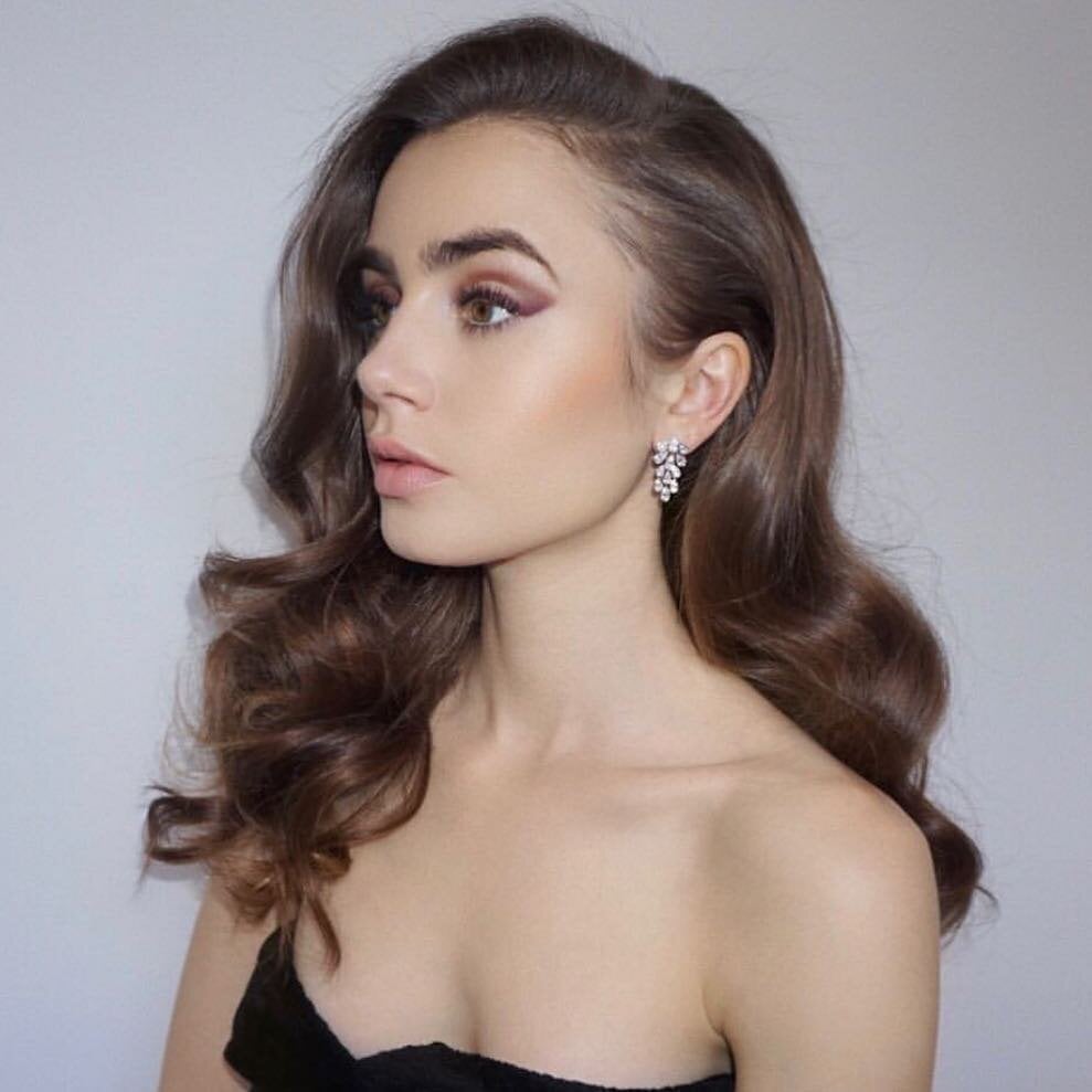 Glossy Dark Brown Waves With Side Bangs — New Years Eve Hairstyles