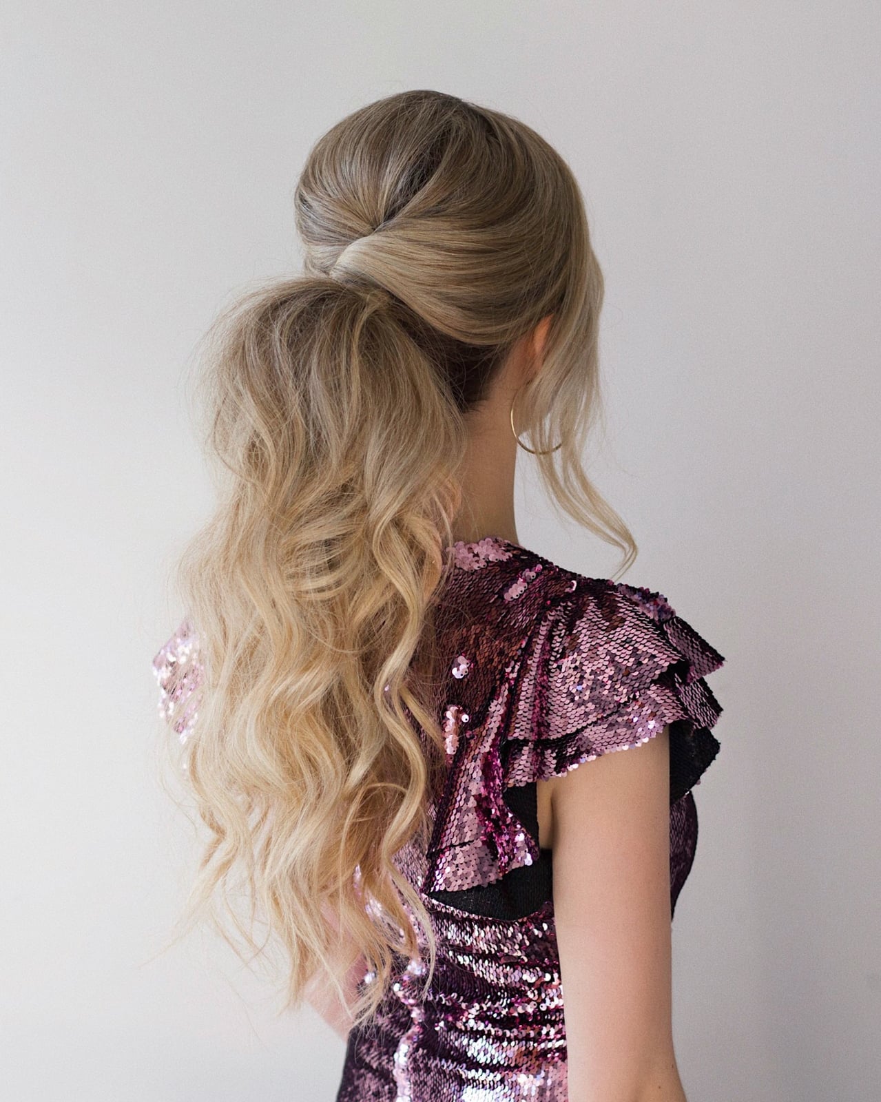 Voluminous Ash Blonde High Ponytail — New Years Eve Hairstyles