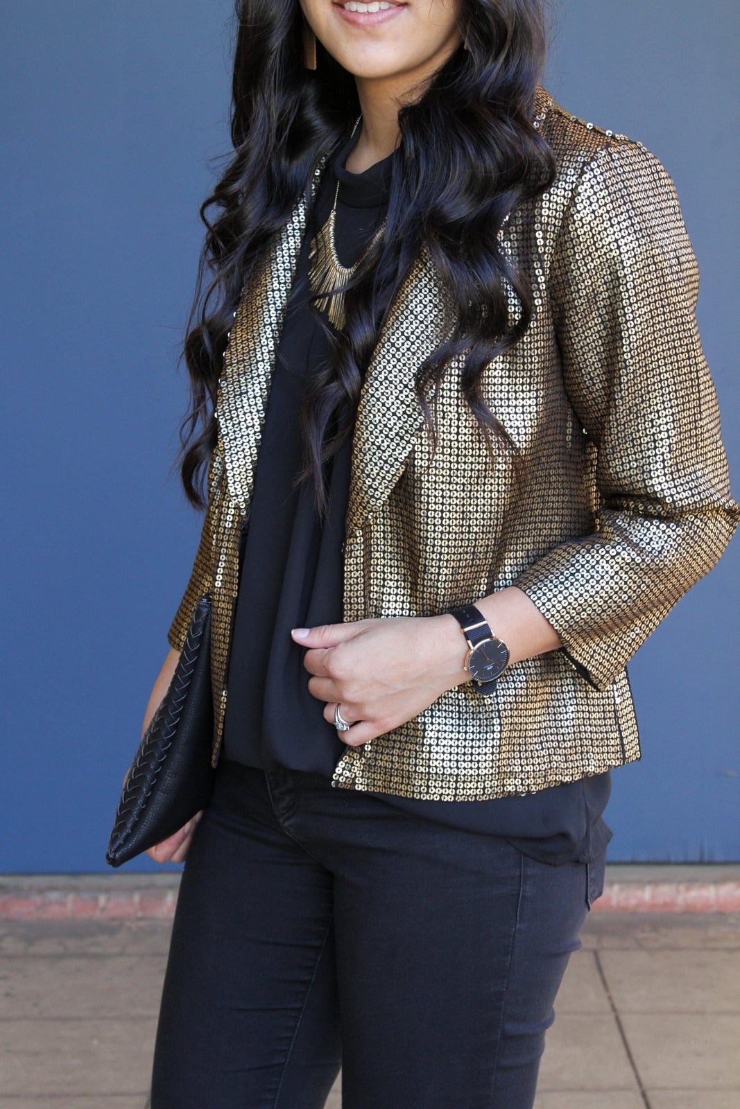 Gold sequin jacket over black jeans and top — New Years Eve Outfits Casual
