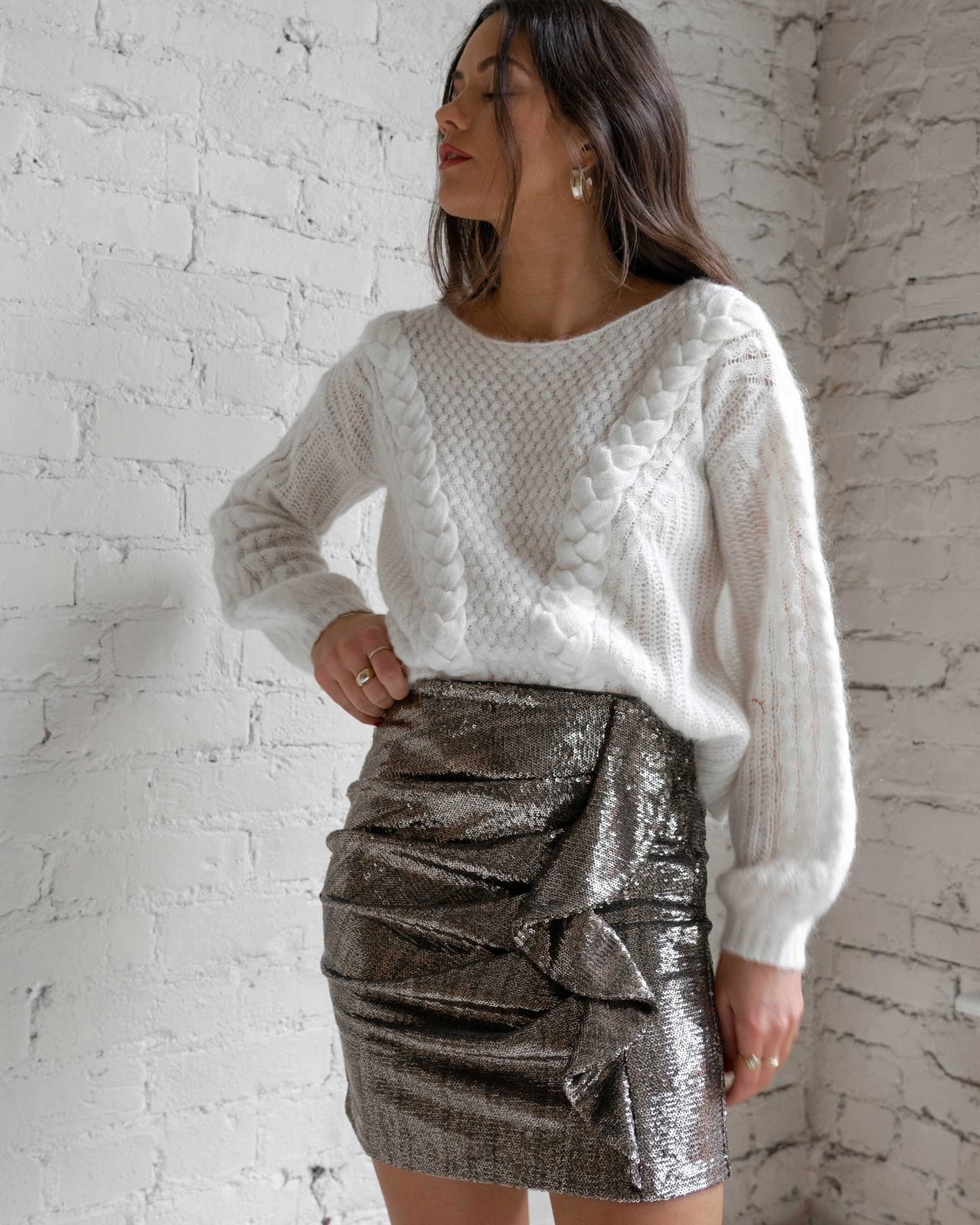 Cable knit sweater with ruffled sequin mini skirt — New Years Eve Outfits Casual