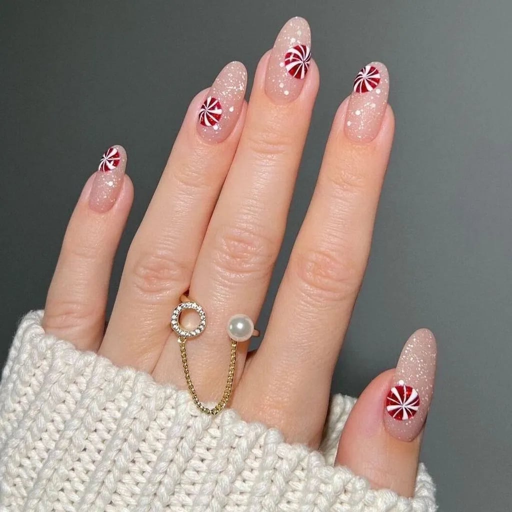 Long Oval Sheer Nude With Candy Stripes Long Oval Sheer Nude With Candy Stripes — Nude Christmas Nails