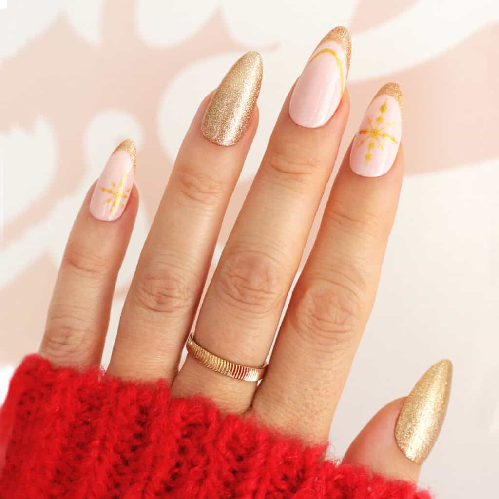 Long Almond Pale Pink With Gold Glitter French Long Almond Pale Pink With Gold Glitter French — Nude Christmas Nails