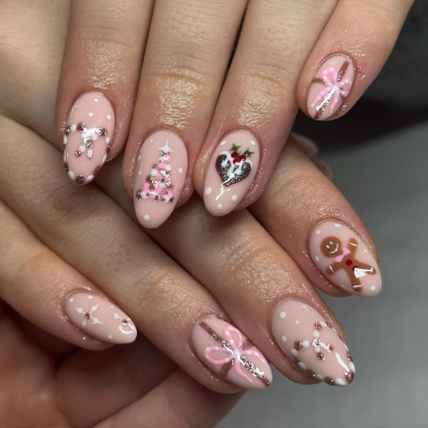 Medium Almond Pink With Christmas Motifs Medium Almond Pink With Christmas Motifs — Nude Christmas Nails