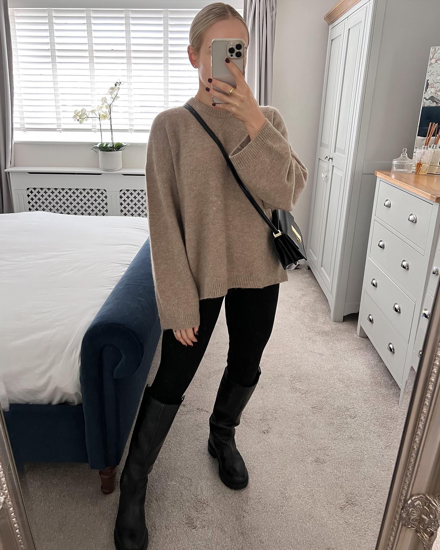 Oversized Beige Knit Sweater And Black Knee High Boots