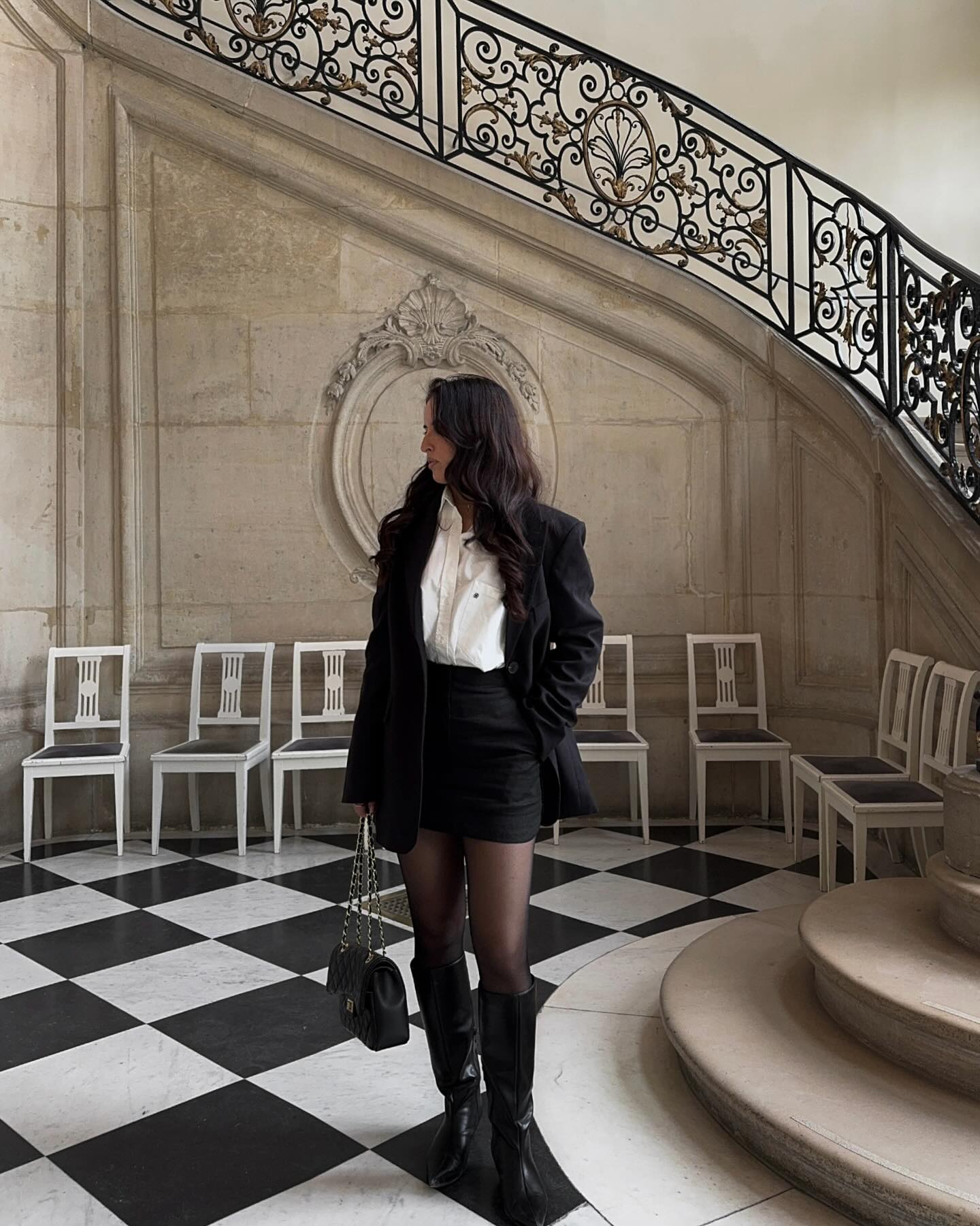 Oversized Black Blazer With Knee High Boots And Mini Skirt