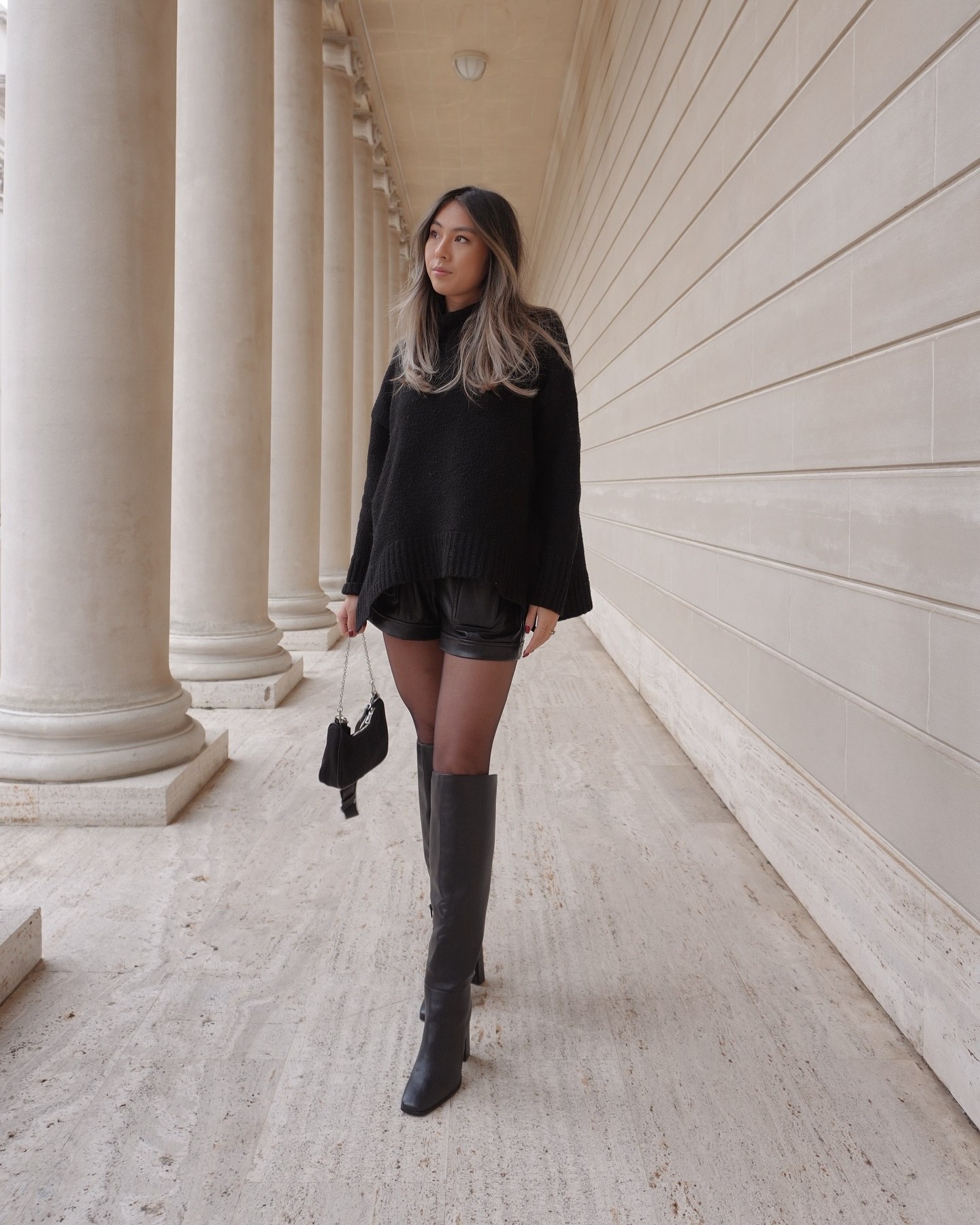 Oversized Black Knit Sweater With Leather Shorts And Boots