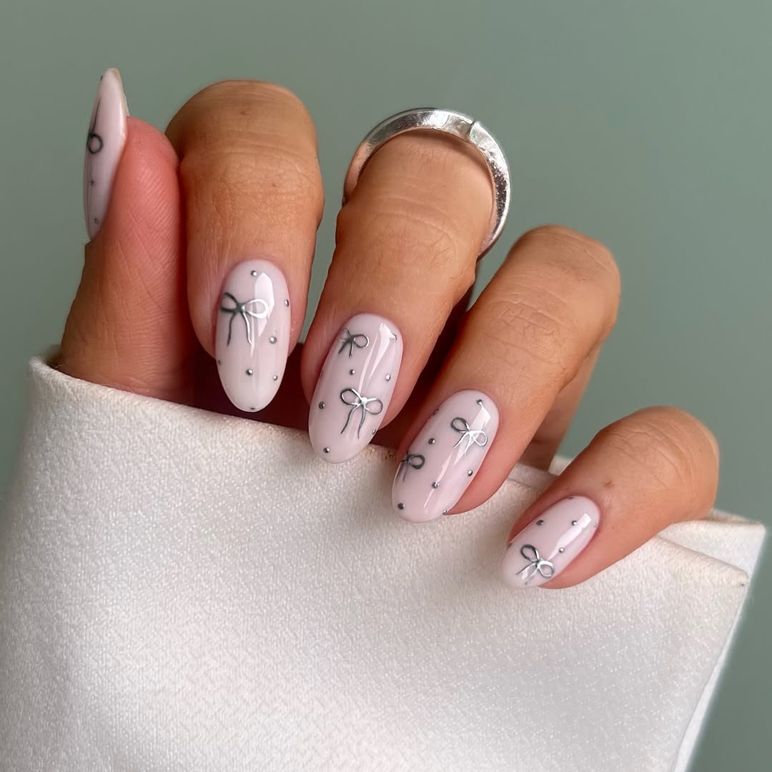 Pale Pink Bows And Pearls Almond Nails