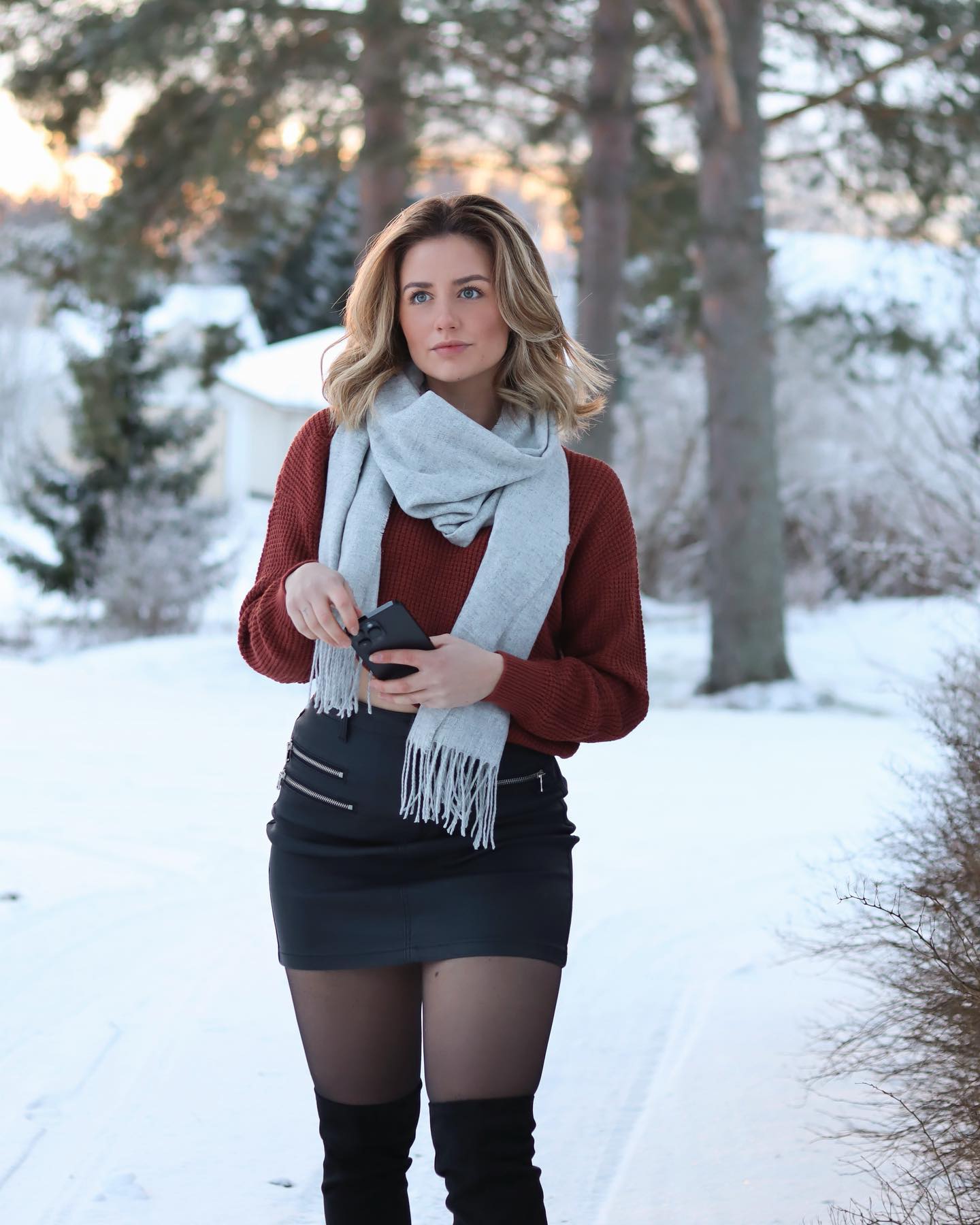 Rust Sweater With Black Leather Mini Skirt Outfit