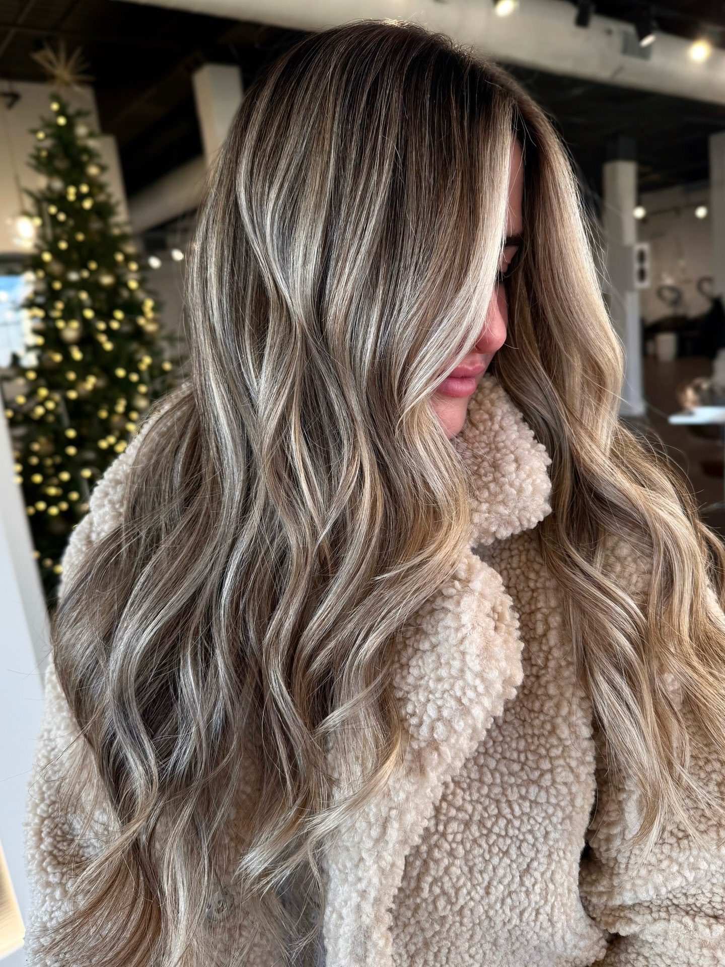 Sandy Blonde Balayage With Face Framing Highlights