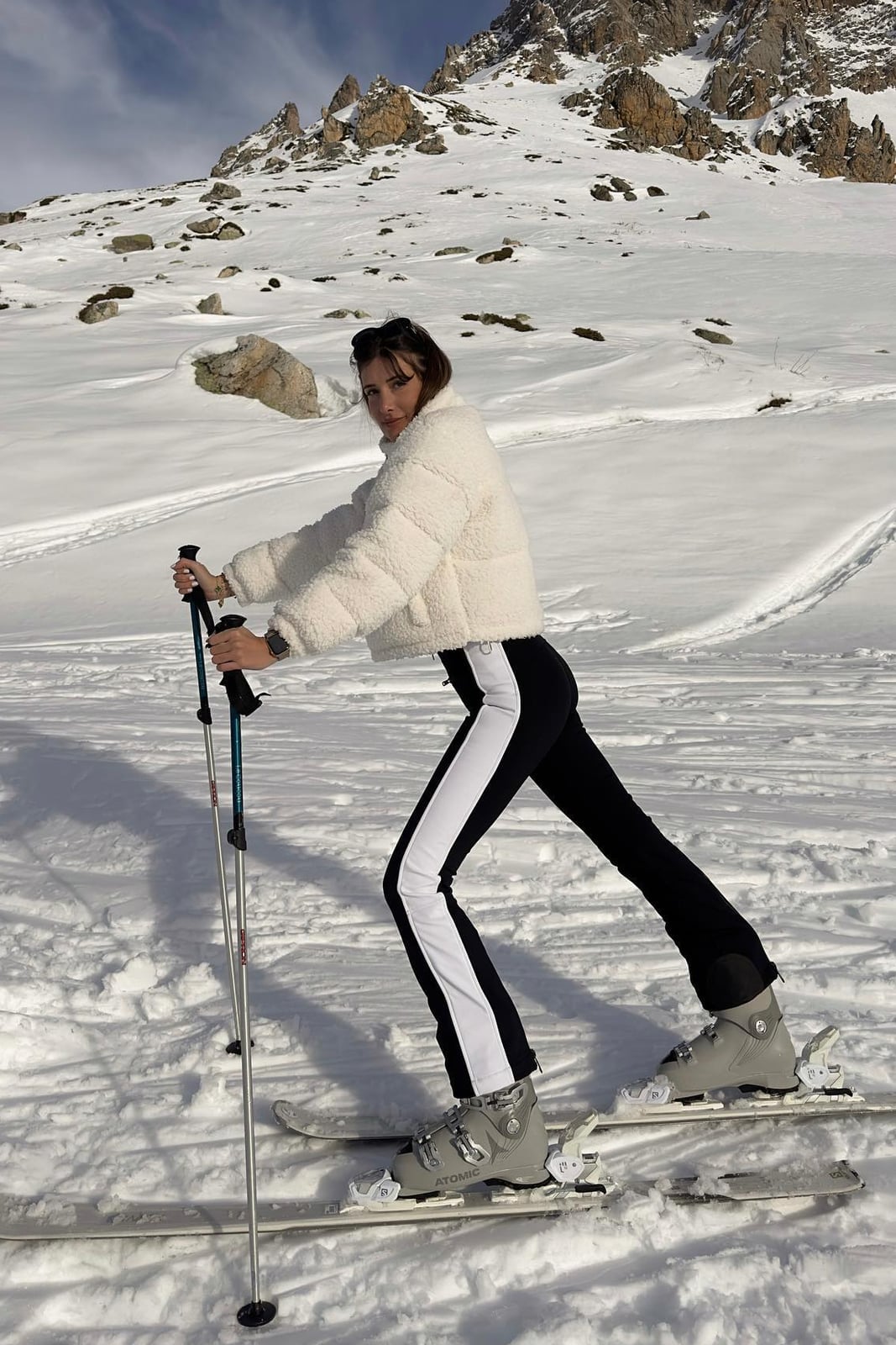Cropped White Fleece Jacket Over Black Base Layer — Ski Outfits for Women