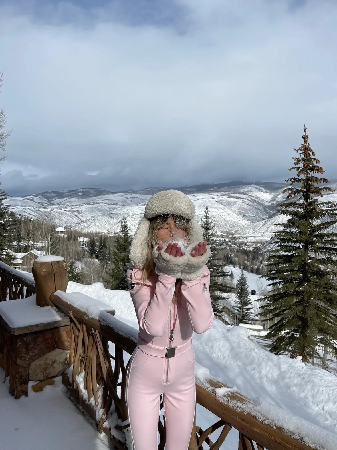 Monochromatic Pink Ski Suit with Fur-Trimmed Hood — Ski Outfits for Women