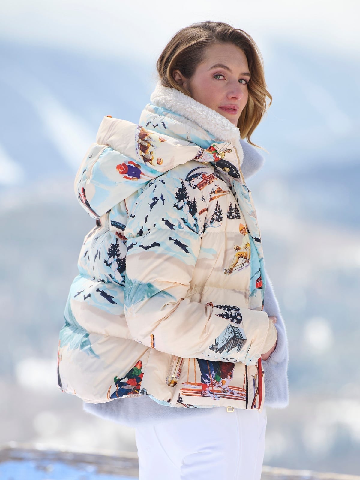 Oversized Cream Puffer Jacket with Ski Scene Print — Ski Outfits for Women
