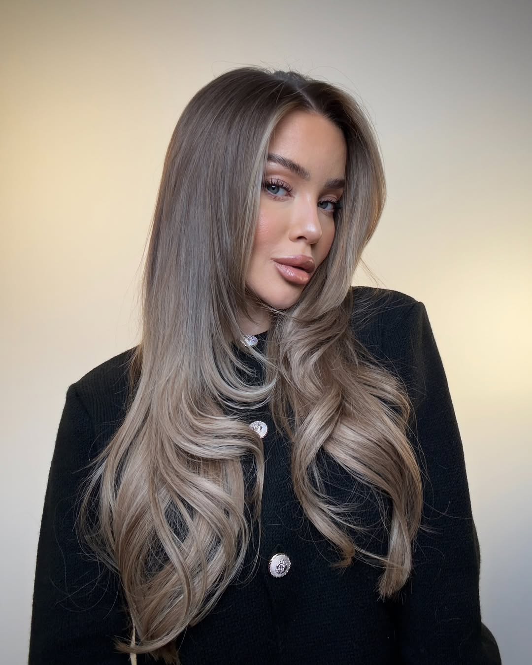 Soft Ash Blonde Waves With Face Framing Layers
