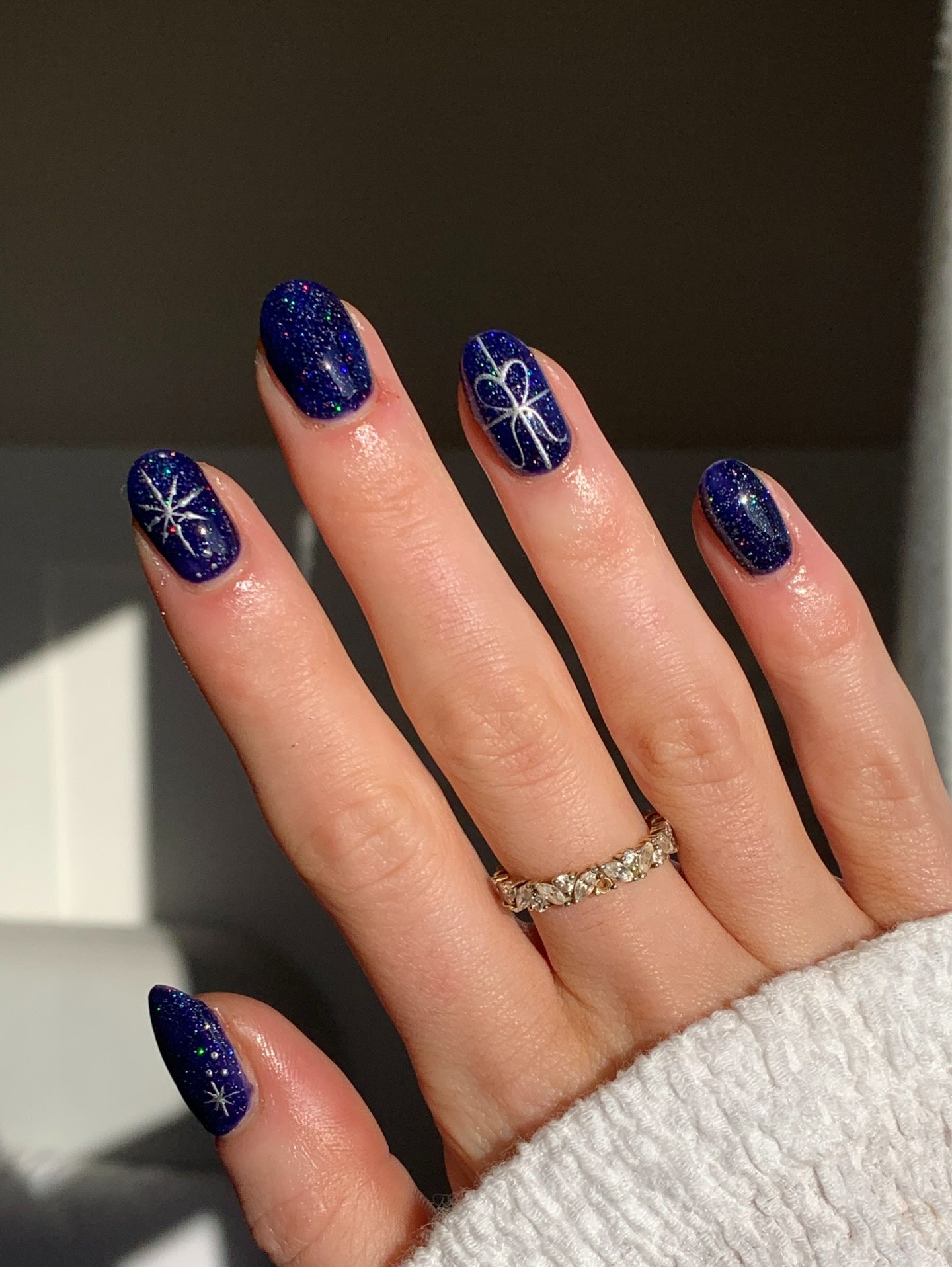 Sparkling Deep Blue Starlight Oval Nails
