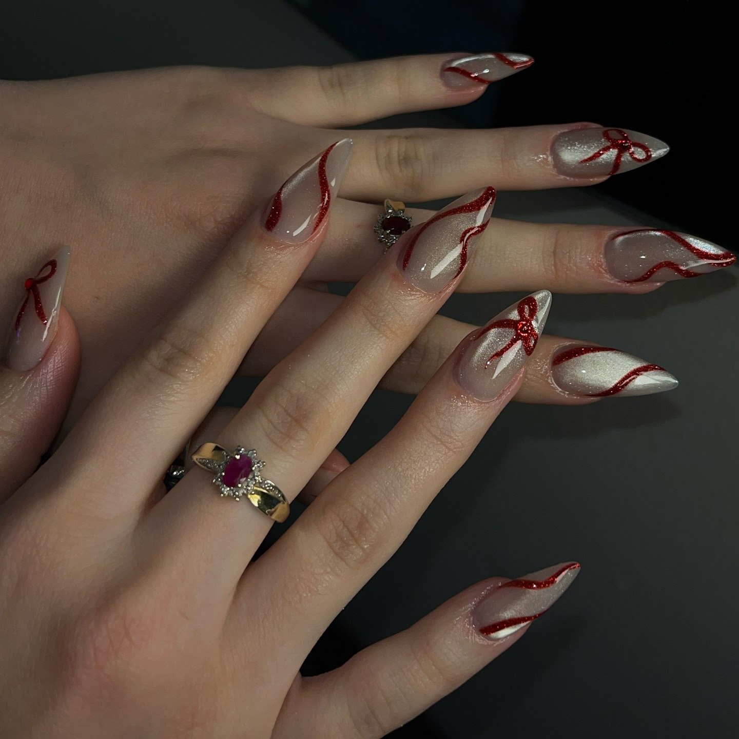 Sparkling Red Bow French Tip Stiletto Nails