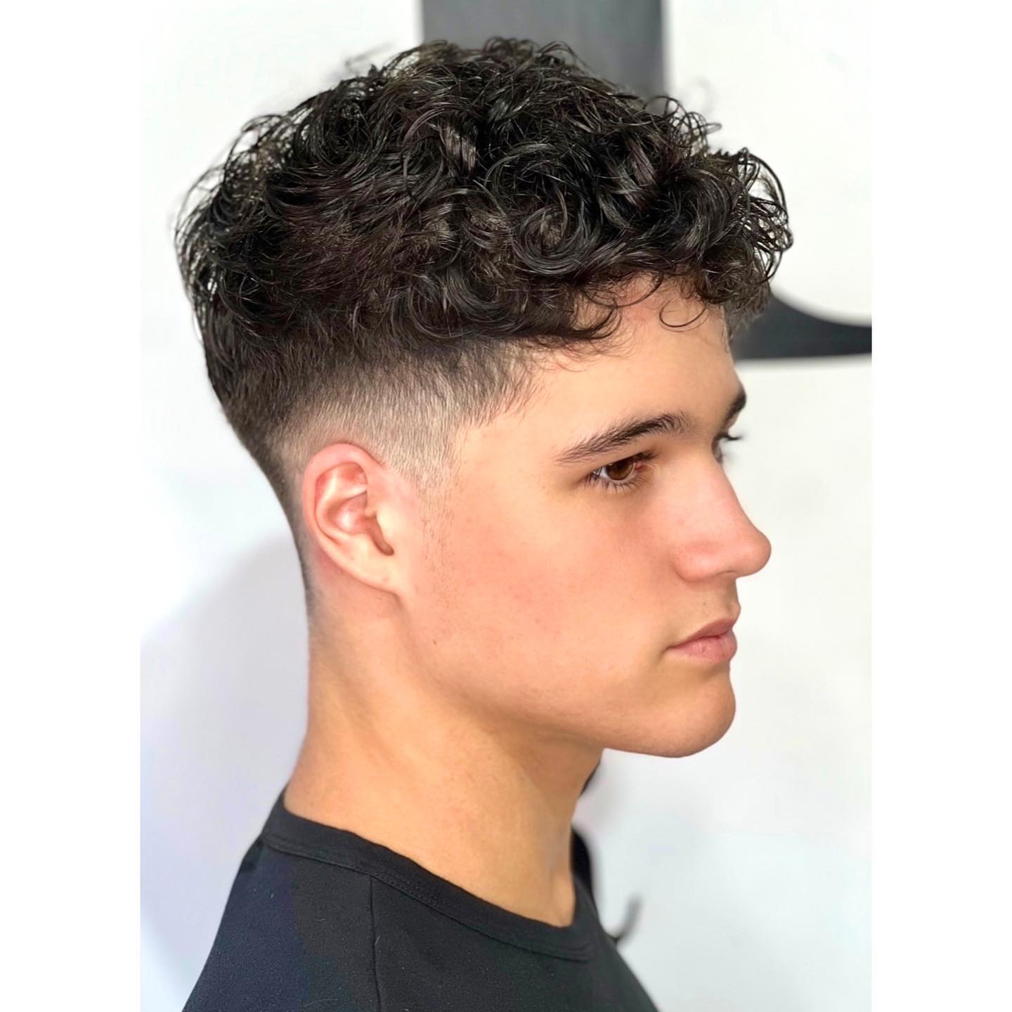 Textured Crop Fade With Defined Curls